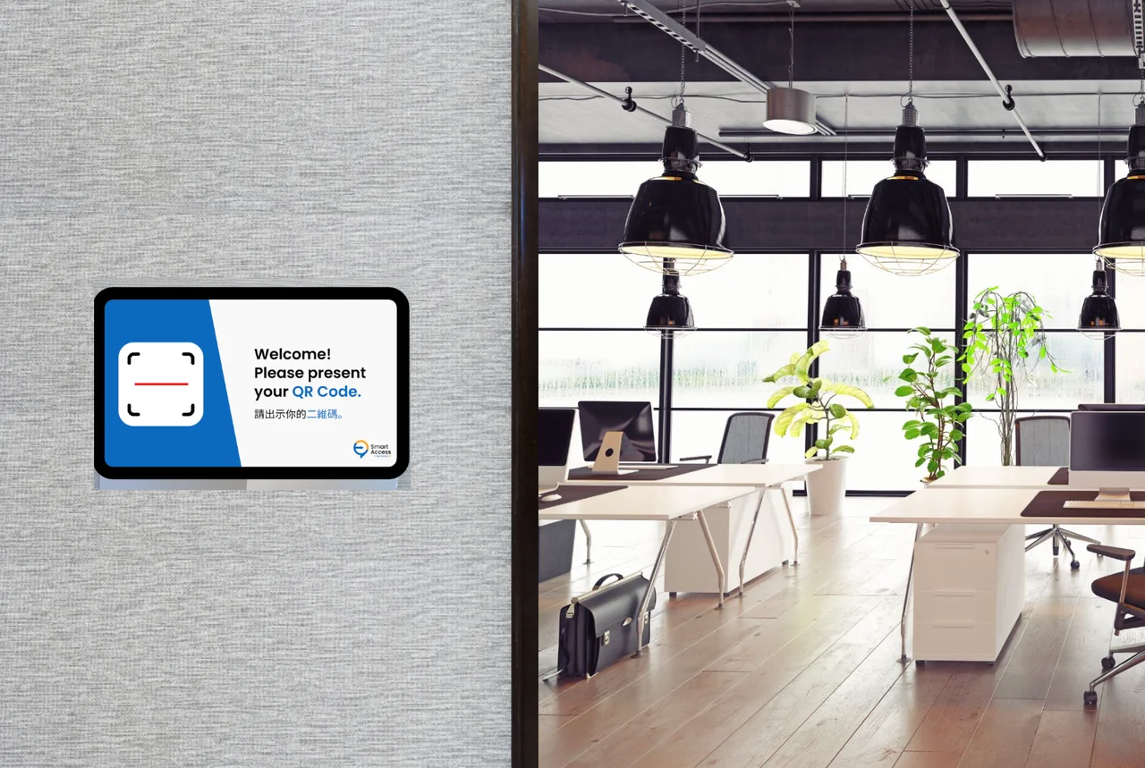 QR scanning tablet mounted beside an office entrance